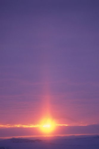 Sun pillar at sunset